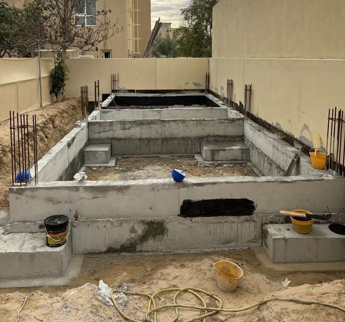Poured foundation with waterproofing